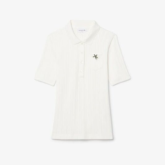 Suéter tipo polo Lacoste con bolsillo y manga corta para dama