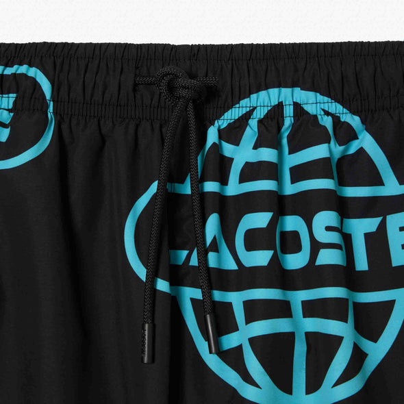 Shorts de bano lacoste para caballero estampado globe