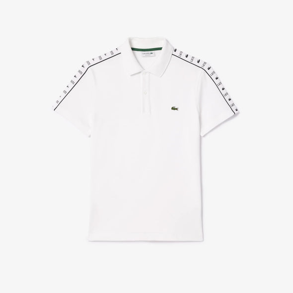 Polo lacoste de pique elastico con raya y logo