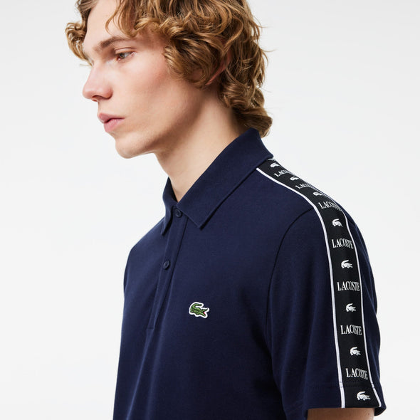 Polo lacoste de pique elastico con raya y logo