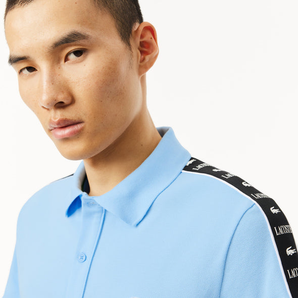 Polo lacoste de pique elastico con raya y logo