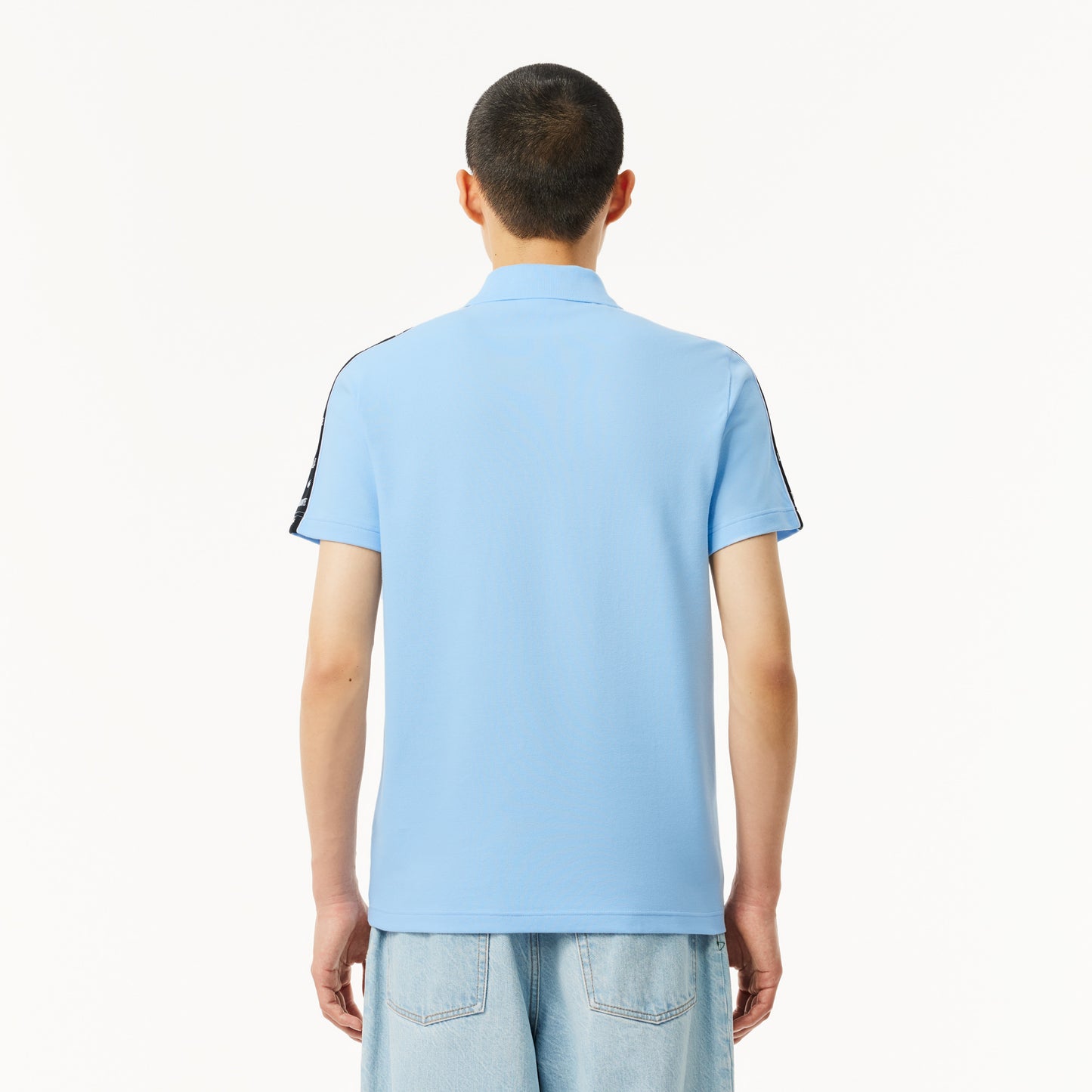 Camiseta tipo polo Lacoste de piqué elástico con raya y logo