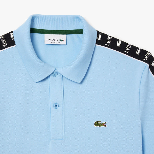 Polo lacoste de pique elastico con raya y logo