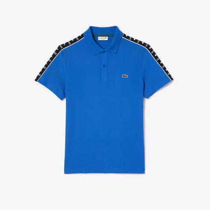 Camiseta tipo polo Lacoste de piqué elástico con raya y logo
