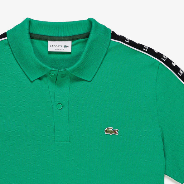 Polo lacoste de pique elastico con raya y logo