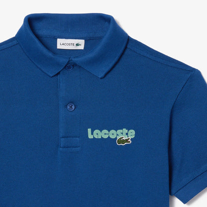 Suéter tipo polo Lacoste para niños