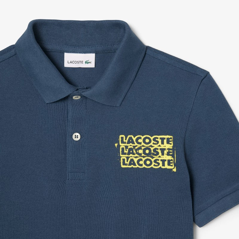 Suéter tipo polo Lacoste para niños
