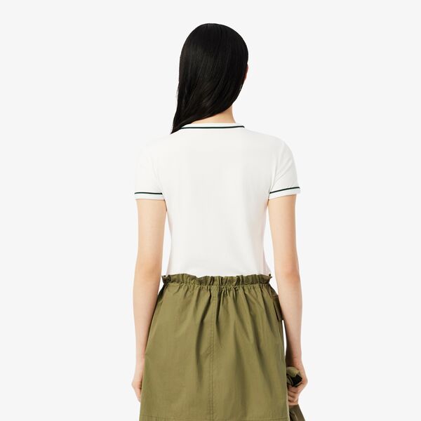 Camiseta Lacoste tipo jersey con vivo en cuello y manga