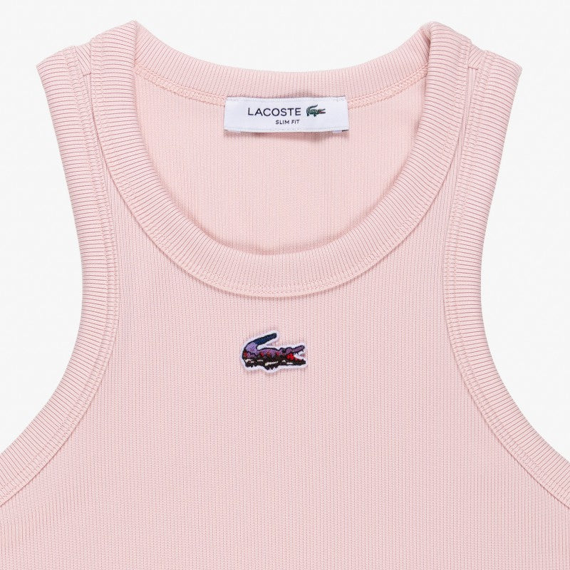 Suéter sport Lacoste sin mangas para dama